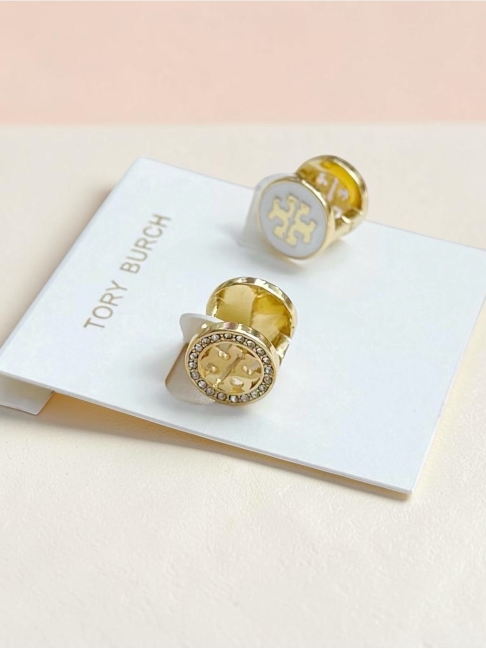 Tory Burch Gold double sided gold and White Logo Earrings.